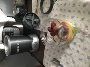 NutriBullet 600 blender with smoothie ingredients