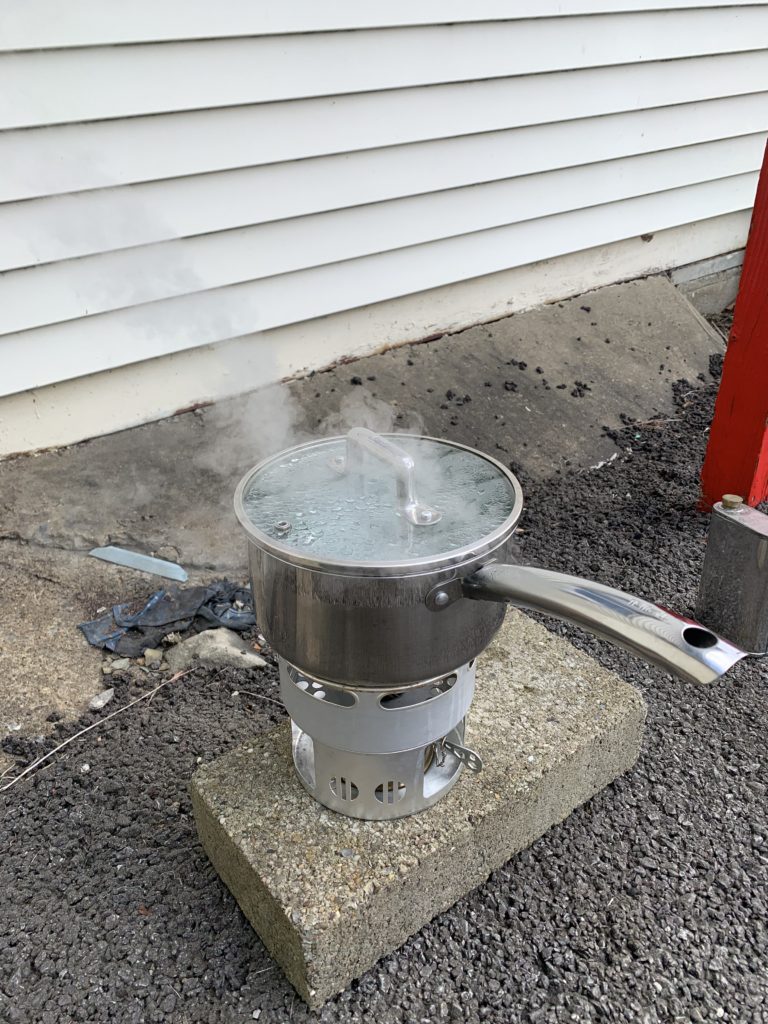 Boiling water for tea on Svea camping stove